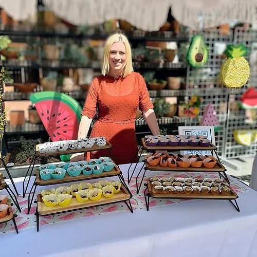 Lindsay the found of Babybird Bakery at a local market selling fresh baked goods.